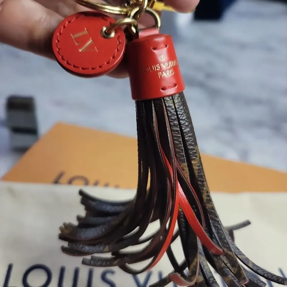 Louis Vuitton Leather Tassel Keychain In EUC FULL INCLUSION
